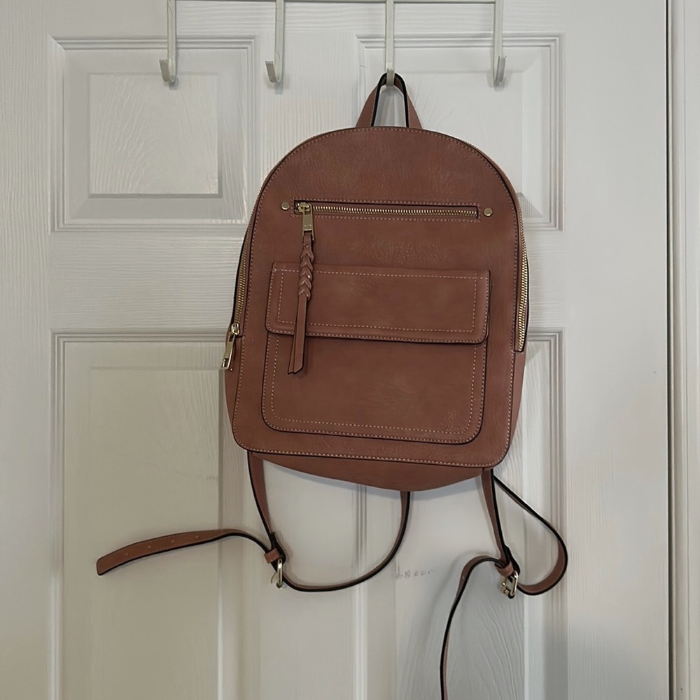 Pink leather backpack